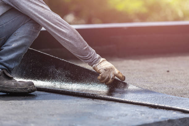 Professional Basement Waterproofing technician working in Owensville, OH